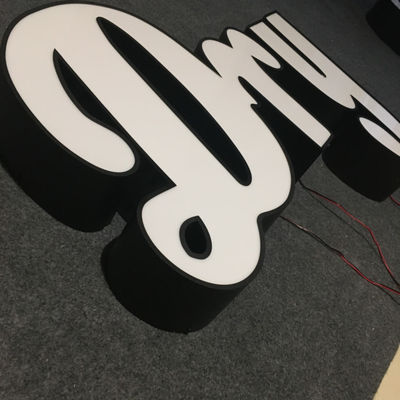 La forma della scatola leggera che annuncia la stampa UV 3D del segno della lettera di Manica ha illuminato l'UL