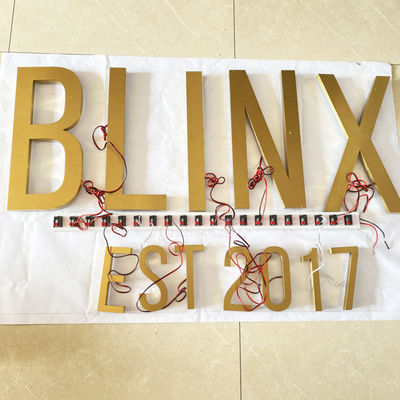 La spazzola ss dell'oro ha illuminato le lettere di Manica Logo Sign Highspan