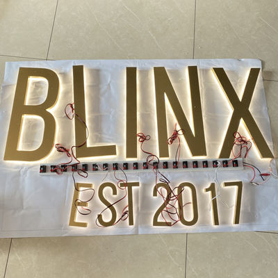 La spazzola ss dell'oro ha illuminato le lettere di Manica Logo Sign Highspan