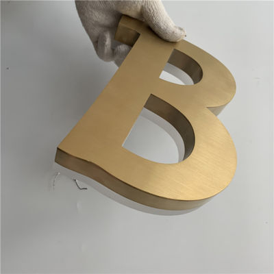 L'oro spazzola le lettere retroilluminate del metallo dei segni di acciaio inossidabile