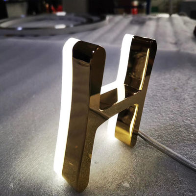 L'affare Logo Signage Stainless Steel Lighted dello specchio dell'oro immagazzina i segni anteriori